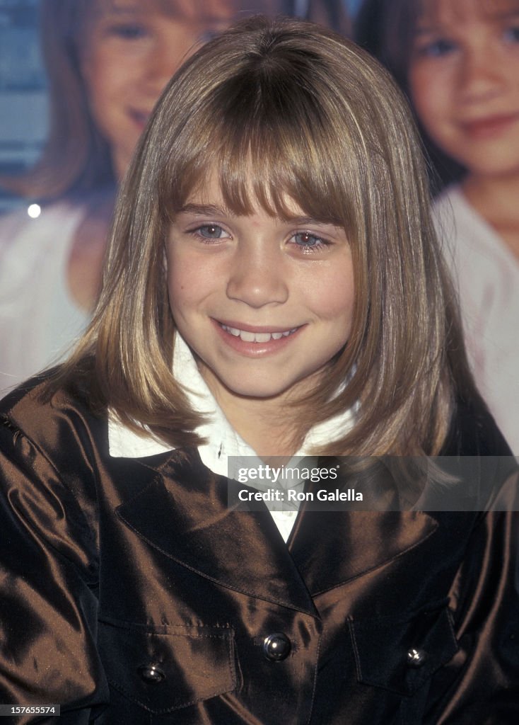 Actress Ashley Olsen autographs copies of the Olsen Twins' New... News