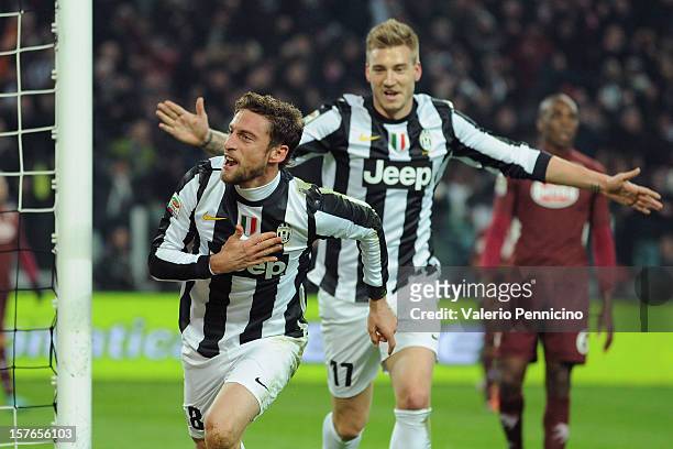 Claudio Marchisio of Juventus celebrates the opening goal during the Serie A match between Juventus and Torino FC at Juventus Arena on December 1,...
