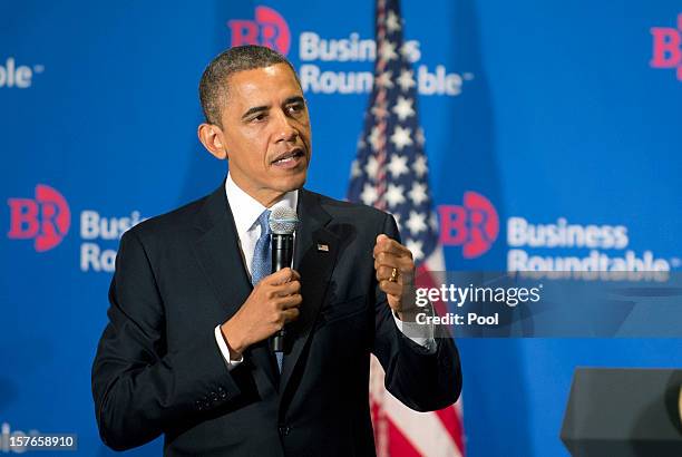 President Barack Obama delivers remarks to members of the Business Roundtable during a meeting at their headquarters on December 5, 2012 in...