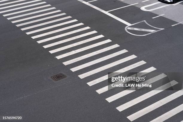 high angle shot of empty asphalt pavement - zebra crossing abstract stock pictures, royalty-free photos & images