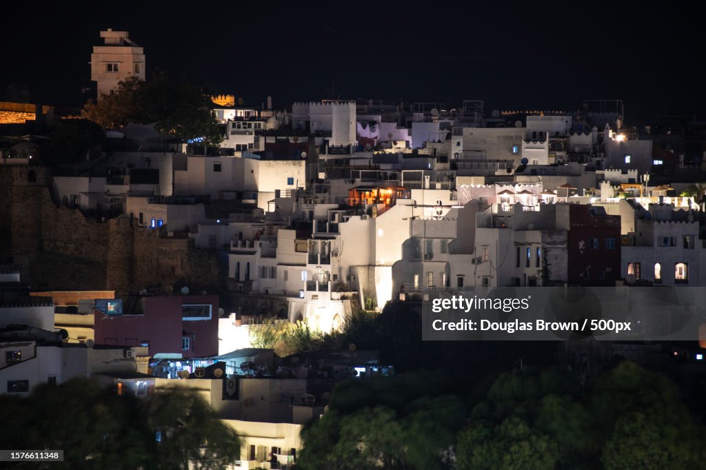 High angle view of illuminated buildings in city at night,Tangier,Morocco