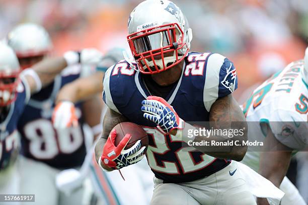 Running back Stevan Ridley of the New England Patriots carries the ball during a NFL game against the Miami Dolphins at Sun Life Stadium on December...