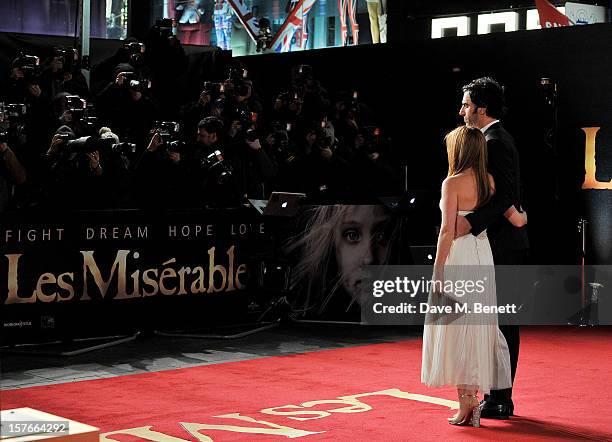 Isla Fisher and Sacha Baron Cohen attend the World Premiere of 'Les Miserables' at Odeon Leicester Square on December 5, 2012 in London, England.