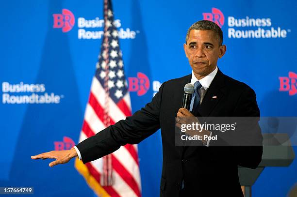 President Barack Obama delivers remarks to members of the Business Roundtable during a meeting at their headquarters on December 5, 2012 in...