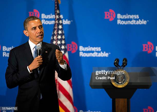 President Barack Obama delivers remarks to members of the Business Roundtable during a meeting at their headquarters on December 5, 2012 in...