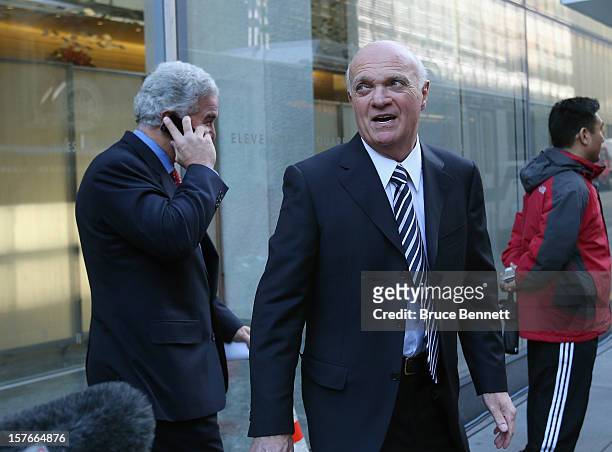New Jersey Devils General Manager Lou Lamoriello leaves the leagues legal offices following the National Hockey League Board of Governors meeting on...