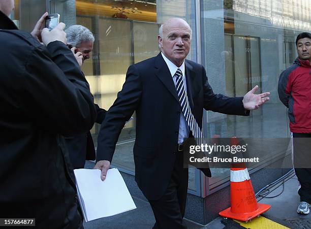 New Jersey Devils General Manager Lou Lamoriello leaves the leagues legal offices following the National Hockey League Board of Governors meeting on...