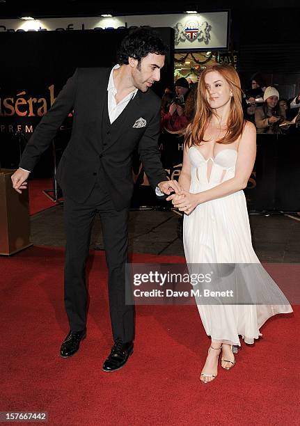 Sacha Baron Cohen and Isla Fisher attend the World Premiere of 'Les Miserables' at Odeon Leicester Square on December 5, 2012 in London, England.