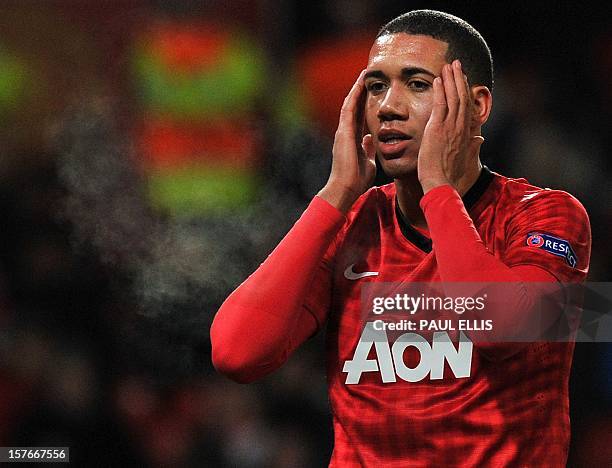 Manchester United's English defender Chris Smalling reacts during the UEFA Champions League group H football match between Manchester United and CFR...