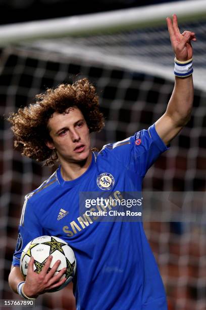 David Luiz of Chelsea celebrates after scoring the opening goal from the penalty spot during the UEFA Champions League group E match between Chelsea...