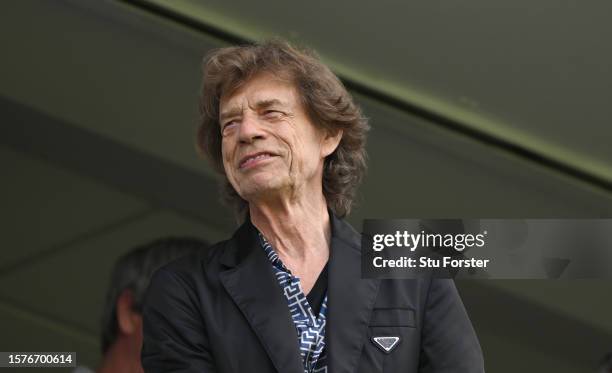 The Rolling Stones lead singer Mick Jagger smiles as he watches the cricket during day two of the LV= Insurance Ashes 5th Test Match between England...