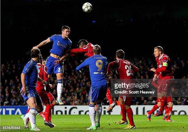 Gary Cahill of Chelsea rises above the FC Nordsjaelland to score his team's third goal with a header during the UEFA Champions League group E match...