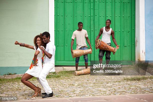 young black couple dancing salsa - salsa dancer stock pictures, royalty-free photos & images