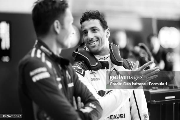 19th placed qualifier Daniel Ricciardo of Australia and Scuderia AlphaTauri and 16th placed qualifier Alexander Albon of Thailand and Williams talk...