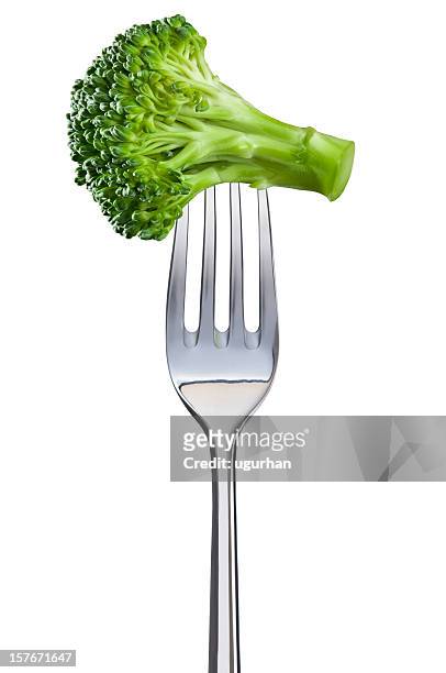 broccoli su una forchetta - forchetta foto e immagini stock