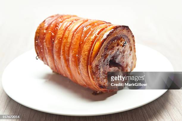 roasted pork - roast pig stock pictures, royalty-free photos & images