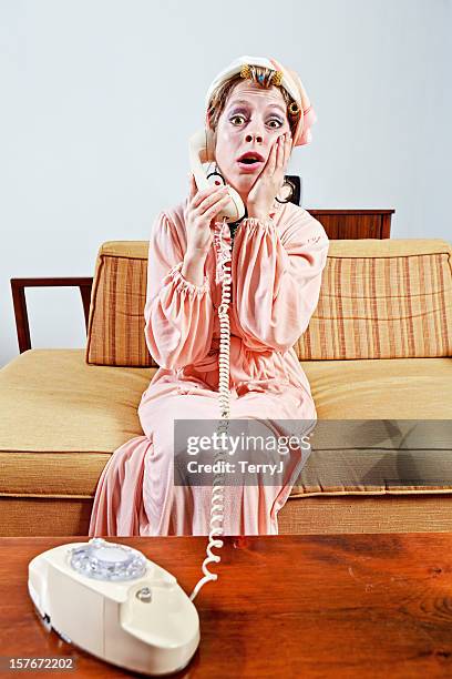 alarming news - woman bathrobe stock pictures, royalty-free photos & images