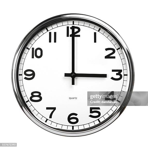 a standard clock displaying three o'clock  - 3 hours stock pictures, royalty-free photos & images