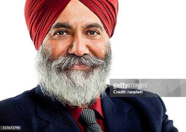 businessman wearing a turban. isolated - turban stock pictures, royalty-free photos & images
