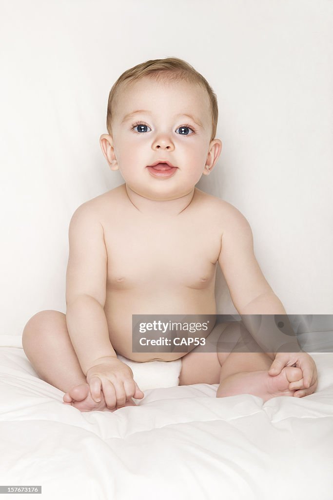 Portrait Of A Beautiful Smiling Baby Boy