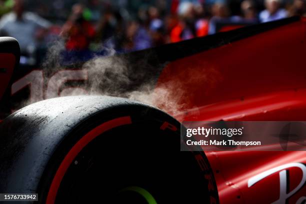 Steam from the car wheel of Charles Leclerc of Monaco driving the Ferrari SF-23 is pictured during qualifying ahead of the F1 Grand Prix of Belgium...