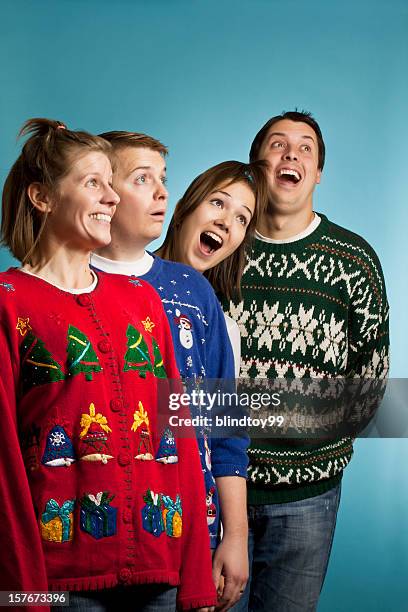look up, it's sweaters! - ugly christmas sweater design stock pictures, royalty-free photos & images