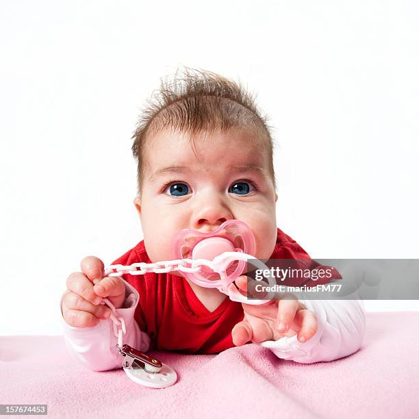 bebé y chupete - sucking fotografías e imágenes de stock