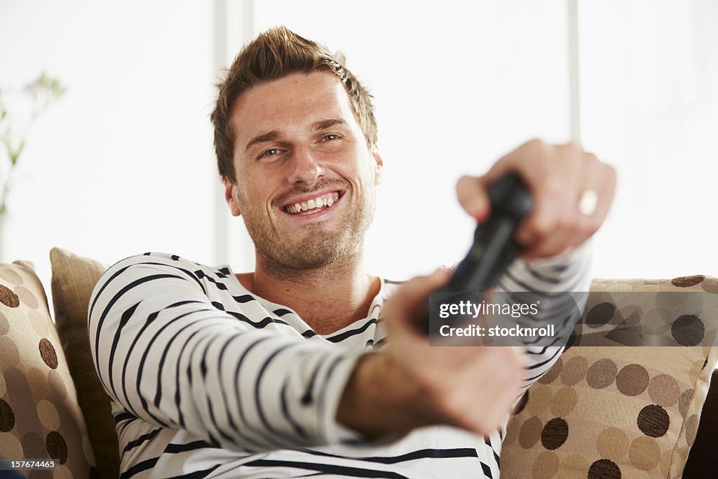 Male playing video game
