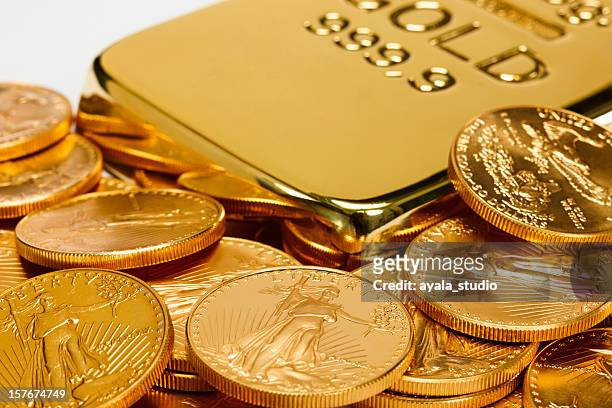 gold barren, münzen - gold coin stock-fotos und bilder