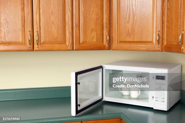 microwave with coffee - microwave dish stock pictures, royalty-free photos & images