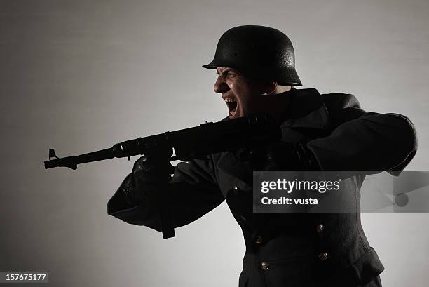 attacking german soldier - nazi soldier stockfoto's en -beelden