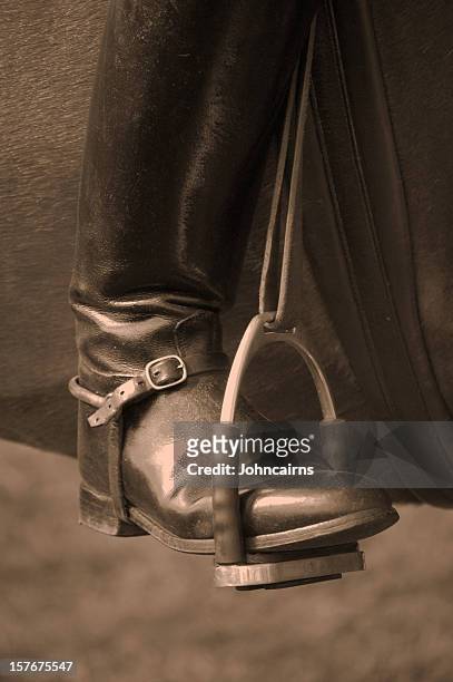 boot in stirrup. - stirrup stock pictures, royalty-free photos & images