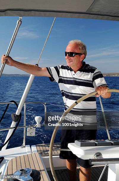 captain of the yacht - motor yacht stock pictures, royalty-free photos & images