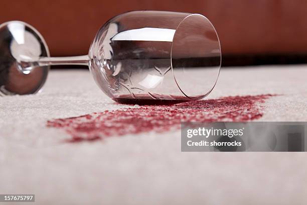 spilled wine in living room - damaged carpet stock pictures, royalty-free photos & images