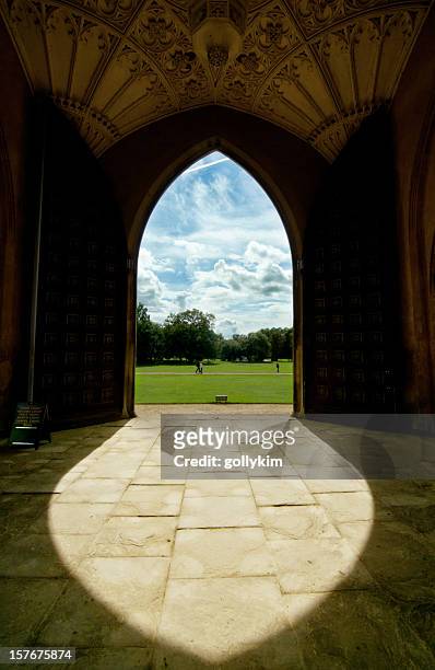 university entrance in cambridge - cambridge england stock pictures, royalty-free photos & images