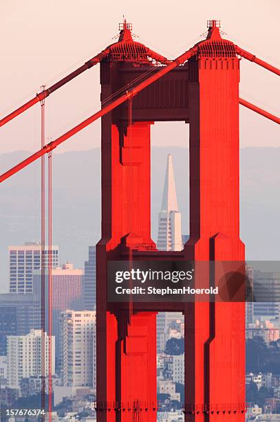 transamerica pyramid centered with the golden gate bridge north tower - transamerica pyramid stock pictures, royalty-free photos & images
