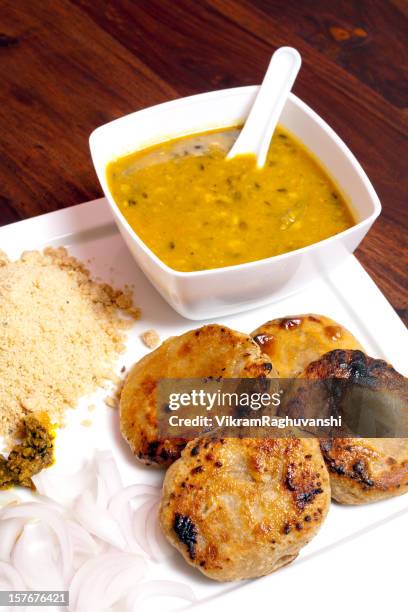 rajasthani dish cusine meal called dal baati churma - dahl stock pictures, royalty-free photos & images