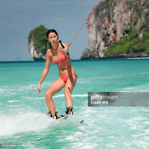 female wakeboarder (xxl) - wakeboarding stock pictures, royalty-free photos & images