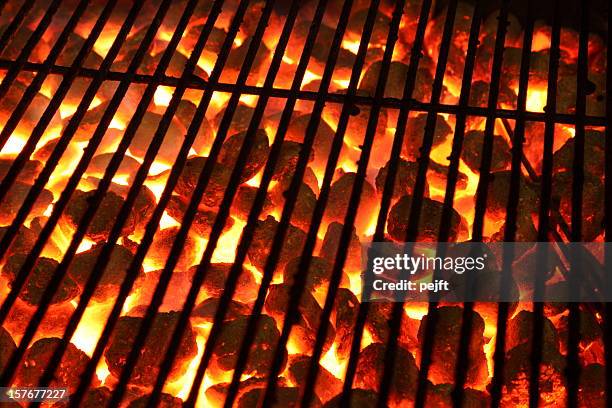 glowing burning hot barbeque grill - briquet stockfoto's en -beelden