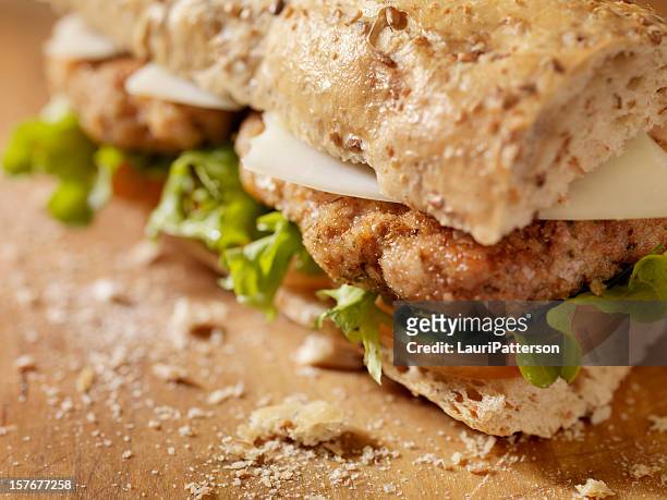 rustic chicken cutlet sandwich - schnitzel stock pictures, royalty-free photos & images