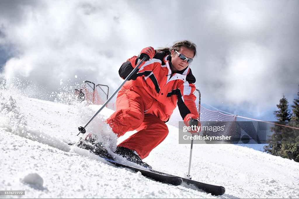 Man skiing on a slope.