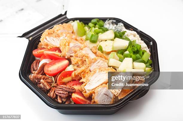 southern cobb salad in black plastic bowl - convenience food stockfoto's en -beelden