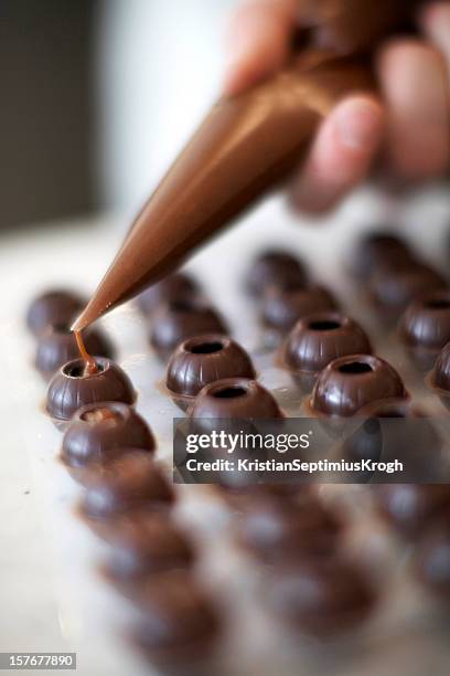 ganach filled chocolates - confectioner stock pictures, royalty-free photos & images