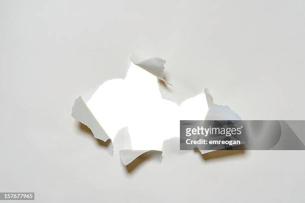white torn paper - deep hole stock pictures, royalty-free photos & images