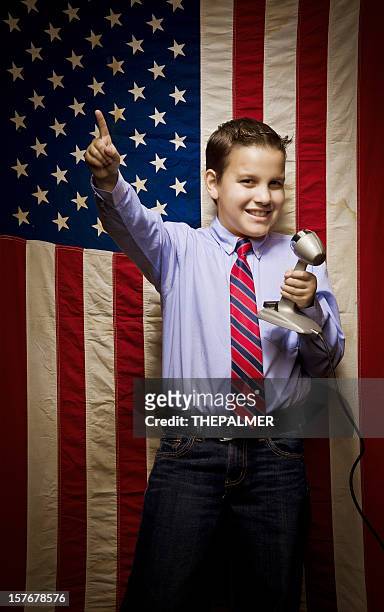 young kid making a presidential school speech - kid president stock pictures, royalty-free photos & images