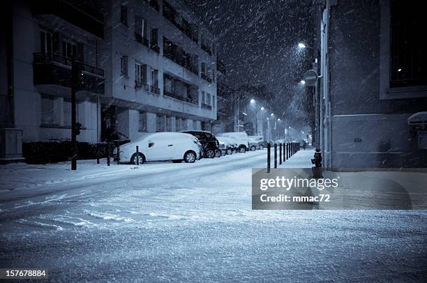 snowy night on the street - street dusk stock pictures, royalty-free photos & images