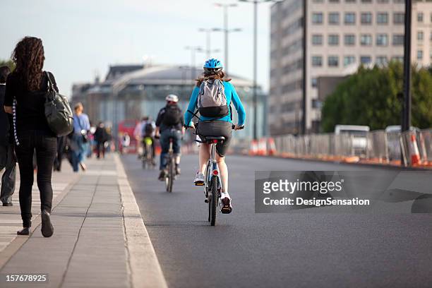 commuters on foot and cycling (xxxl) - cycling uk stock pictures, royalty-free photos & images