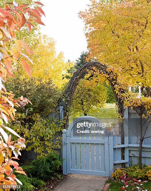 garden gate and fall colors - formal garden gate stock pictures, royalty-free photos & images