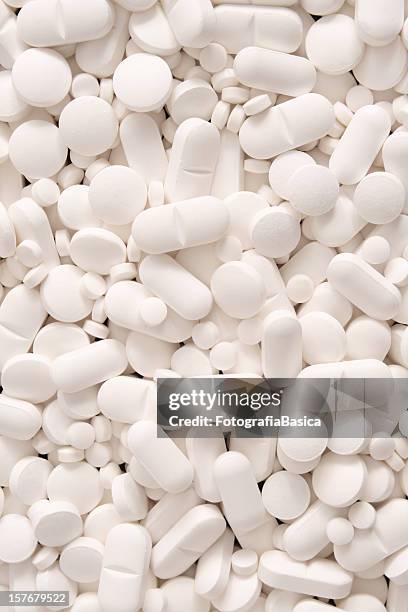 white pills background - pill background stock pictures, royalty-free photos & images