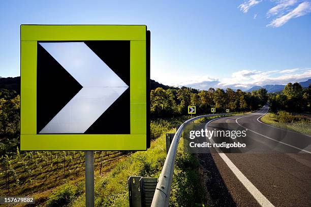 road sign - arrows landscapes stock pictures, royalty-free photos & images